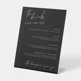 Die Getränke sind auf uns Minimalistisch Drinks un Sockelschild