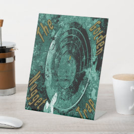 Die goldene Nugget-Falle Sockelschild