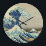 Die große Welle vor Kanagawa Wanduhr<br><div class="desc">This numberless wall clock feys very famous Japanese woodblock print called Kanagawa Okinami-Ura (神 奈 川浪), known in English under the name The Great Wave off Kanagawa. It was first printed during the 1830s by an artist named Katsushika Hokusai as a part of his Thirty-Six Views of Mount Fuji series....</div>