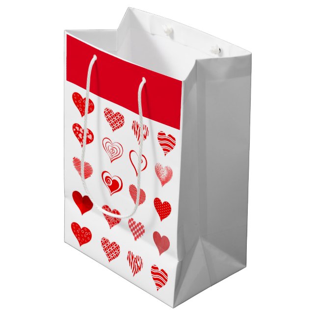 Die Herz-Geschenk-Tasche des Valentinsgrußes Mittlere Geschenktüte (Vorderseite Schrägansicht)