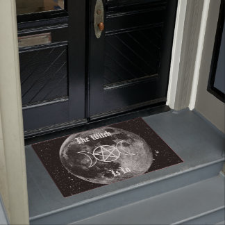 Die Hexe ist in Fußmatte