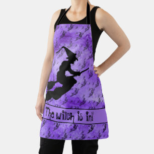 Die Hexe ist in Halloween Hexe-Silhouette Lila Schürze