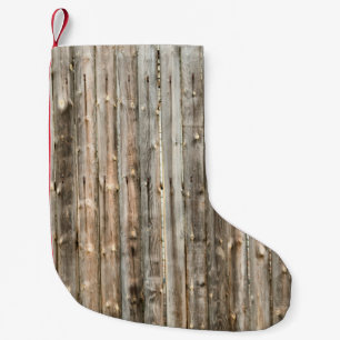 Die Inneneinrichtung aus altem Holz, das Backgröss Kleiner Weihnachtsstrumpf