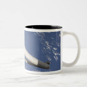 Die integrierte Fracht-Fördermaschine Zweifarbige Tasse