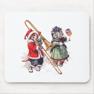 Die Katze legt die Knochen im Schnee Mousepad