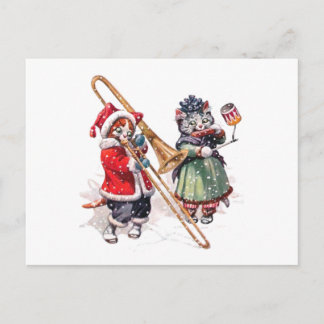 Die Katze legt die Knochen im Schnee Postkarte