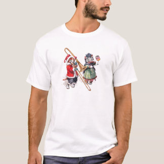 Die Katze legt die Knochen im Schnee T-Shirt