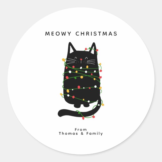 Die lustige schwarze Katze hat sich im Weihnachtsl Runder Aufkleber (Vorderseite)