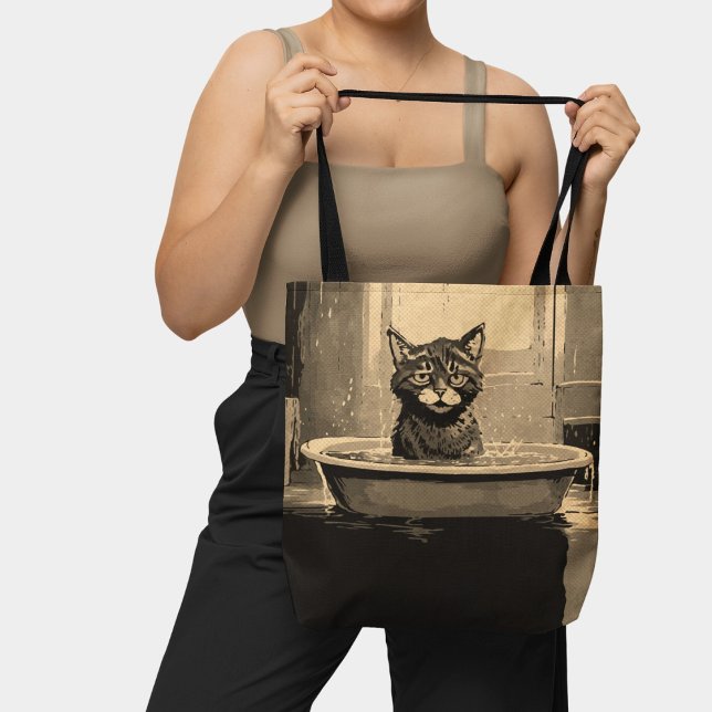 Die lustige, wütende Katze in der Badewanne, schwa Tasche (Von Creator hochgeladen)