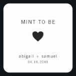 Die moderne Schwarz-Weiß-Gastgeschenk Hochzeit ist Quadratischer Aufkleber<br><div class="desc">Moderne Gastgeschenk Hochzeit Aufkleber mit minimalem Design mit der Meldung "Mint To Be" mit Herz und Namen und Datum in schwarz,  auf weißem Hintergrund. Die Schriftart und Hintergrundfarben können beliebig verändert werden. Diese einfachen,  zeitgenössischen Aufkleber sind perfekt für das minimalistische Paar und fügen Ihren Gefallen eine persönliche Touch hinzu.</div>