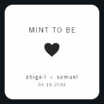 Die moderne Schwarz-Weiß-Gastgeschenk Hochzeit ist Quadratischer Aufkleber<br><div class="desc">Moderne Gastgeschenk Hochzeit Aufkleber mit minimalem Design mit der Meldung "Mint To Be" mit Herz und Namen und Datum in schwarz,  auf weißem Hintergrund. Die Schriftart und Hintergrundfarben können beliebig verändert werden. Diese einfachen,  zeitgenössischen Aufkleber sind perfekt für das minimalistische Paar und fügen Ihren Gefallen eine persönliche Touch hinzu.</div>
