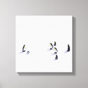 Die Pinguine, die Fußball spielen Leinwanddruck