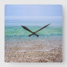 Die ruhige Uhr am Strand