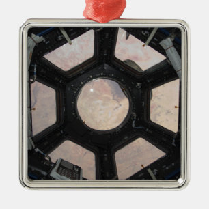 Die Sahara-Wüste sichtbar durch die Fenster Silbernes Ornament