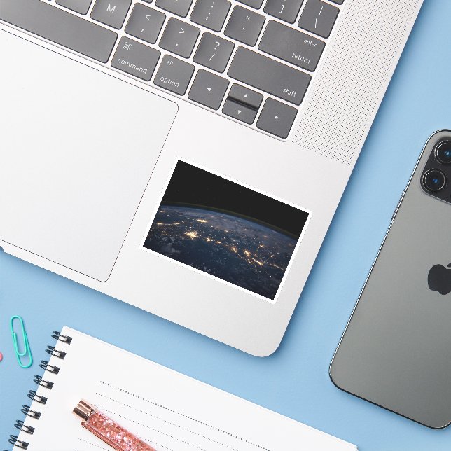 Die Stadtbeleuchtung der südlichen Staaten. Aufkleber (Laptop mit iPhone)