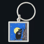 Die Sterne des Schwarzen Owl Tree Schlüsselanhänger<br><div class="desc">Dieses Bild stammt von meinem Computergrafik-Kunstwerk. Es ist eine schwarze Eule mit großen Augen, die auf einem Zweig eines Baumes sitzt. Hinter ihm steht ein gelber Mond. Der Hintergrund ist ein blauer Nachthimmel mit gelben Sternen. Sehen Sie in meinem Shop Art by MAR nach, um Produkte mit diesem Design zu...</div>