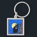 Die Sterne des Schwarzen Owl Tree Schlüsselanhänger<br><div class="desc">Dieses Bild stammt von meinem Computergrafik-Kunstwerk. Es ist eine schwarze Eule mit großen Augen, die auf einem Zweig eines Baumes sitzt. Hinter ihm steht ein gelber Mond. Der Hintergrund ist ein blauer Nachthimmel mit gelben Sternen. Sehen Sie in meinem Shop Art by MAR nach, um Produkte mit diesem Design zu...</div>