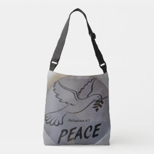 Die Tasche zeigt eine Friedenstaube und eine Schri