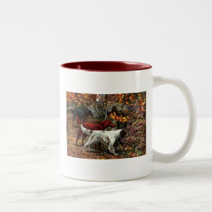 Die Tasse der drei Setter mit zwei Keramiken