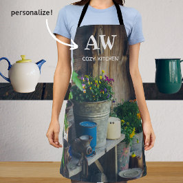 Die Terrasse des Landhauses ist mit lebendigen Sti Schürze