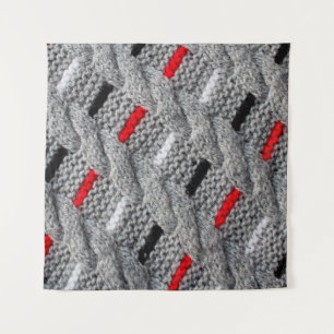 die Textur des Strickstoffes mit gestreiftem p Wandteppich