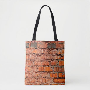 Die Wand aus rotem Ziegelstein ist veraltet, alt, Tasche