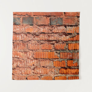 Die Wand aus rotem Ziegelstein ist veraltet, alt, Wandteppich