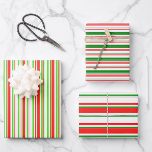Die Weihnachtsmuster sind grün, weiß, rot und farb Geschenkpapier Set