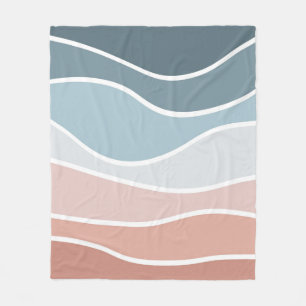 Die Wellen im Retrostil sind blau und rosa. Fleecedecke