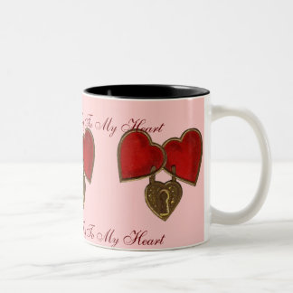 Die zugeschlossenen Herzen des Valentines u. Zweifarbige Tasse