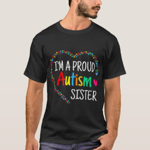 Dieses farbenfrohe autistische Herz aus Puzzleteil T-Shirt