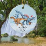 Dinosaur Christmas Raptor Aquarellname Keramik Ornament<br><div class="desc">Dieses Design kann in dem Bereich personalisiert werden, der durch das Ändern des Fotos und/oder Textes zur Verfügung gestellt wird. Sie können auch angepasst werden, indem Sie auf Vorlage personalisieren klicken und dann auf die Schaltfläche klicken, um weitere Optionen anzupassen, um die Hintergrundfarbe zu löschen oder zu ändern, Text hinzuzufügen,...</div>