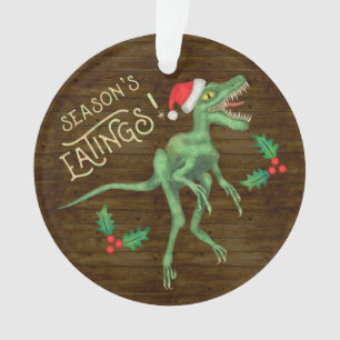 Dinosaure drôle Eatings de Velociraptor de Noël