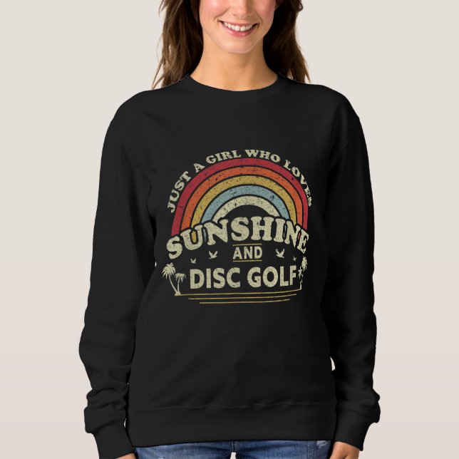 Disk Golf. Ein Mädchen, das Sonnenschein und Platt Sweatshirt (Vorderseite)