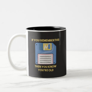 Diskette: Wenn Sie sich daran erinnern, sind Sie a Zweifarbige Tasse
