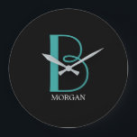 DIY Large Monogram & Name, Teal/White Text, Black Große Wanduhr<br><div class="desc">Personalize this stylish and simple text design with your name in white and your large Monogram in Teal on black background.</div>