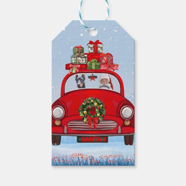Doberman Hund in Auto mit dem Weihnachtsmann Geschenkanhänger (Vorderseite)