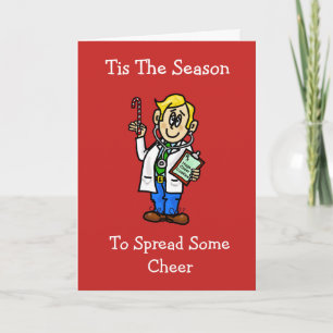 Docteur avec la carte de Noël de sucre de canne