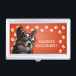 Dog Walker Paw Prints Visitenkarten Dose<br><div class="desc">Dieser Visitenkartenhalter,  personalisiert mit Ihrem Namen,  verfügt über einen niedlichen Terrier Welpe auf hellorange mit weißem Pfotendruck. Vergnügen als Geschenk oder eine tolle Möglichkeit,  Ihre eigenen Visitenkarten zu tragen.</div>