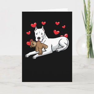 Dogo Argentino Hund mit ausgestopften Tieren und H Karte