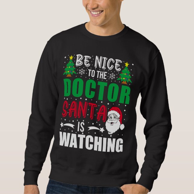 Doktor Santa beobachtet Weihnachten lustig Sweatshirt (Vorderseite)