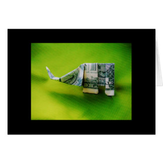 Dollar-Bill Origami Elephant auf grünem Hintergrun
