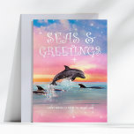 Dolphin Seas & Greetings Beach Weihnachten<br><div class="desc">Weihnachts-Weihnachtskarte zum Thema Beach bietet einen Delphin,  der unter einem magischen Sternenhimmel mit einer "Seas & Greetings"-Beschriftung überspringt. Kunst von KL Stock</div>