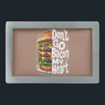 Don't Go Bacon My Heart Funny Food Pun Rechteckige Gürtelschnalle<br><div class="desc">This bold and humorous design features a towering, mouthwatering cheeseburger stacked high with juicy patties, dripping melted cheese, crisp lettuce, and fresh tomatoes. Paired with the clever pun, "Don't Go Bacon My Heart, " in a playful, hand-drawn font, this artwork is perfect for food lovers who appreciate a good joke....</div>
