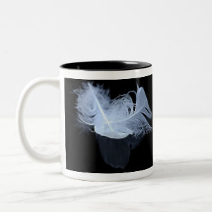 Doppelflammenfedern und -reflexion zweifarbige tasse