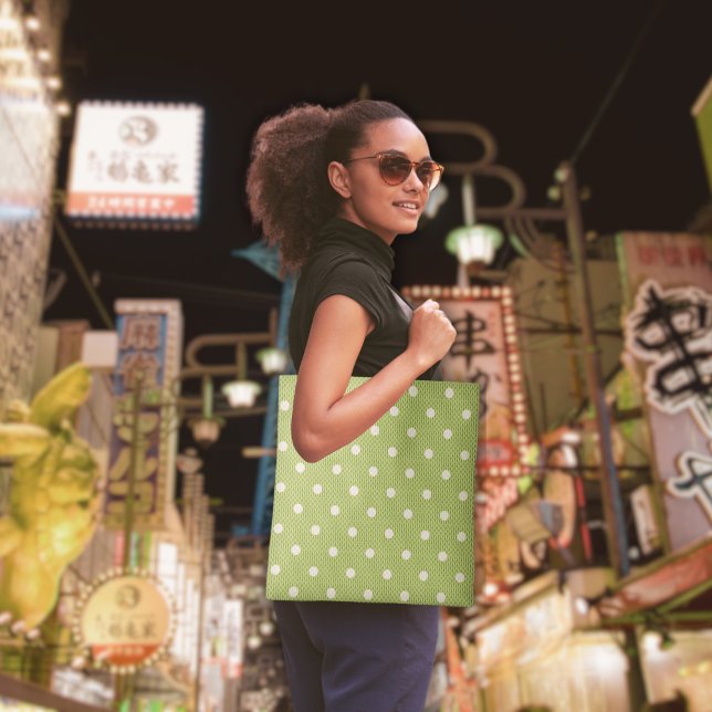 Dotty Delight Green Tasche (A woman holds a Dotty Delight Green Tote Bag.)