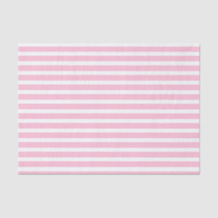 Doucement rose et blanc barre le papier de soie de
