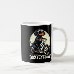 Doxycyclin Apotheke lustiger Dachshund auf Fahrrad Kaffeetasse