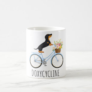 Doxycyclin-Apotheke Pun, Dachshund auf Fahrrad, Kaffeetasse