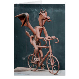 Drache auf dem Fahrrad